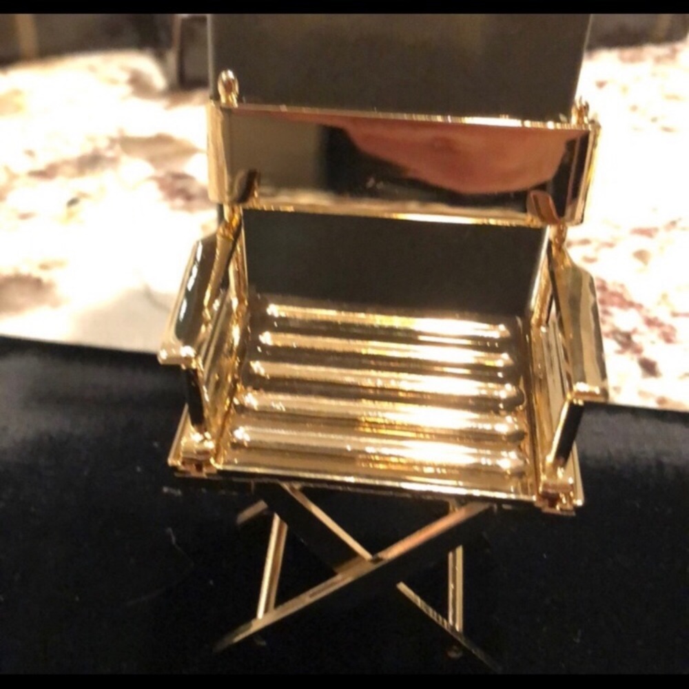 BRAND NEW! ambassador gold magnetic paper clip chair.